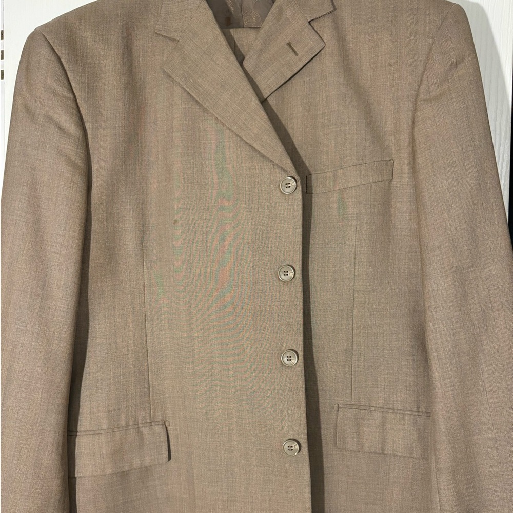 Tan four button suit